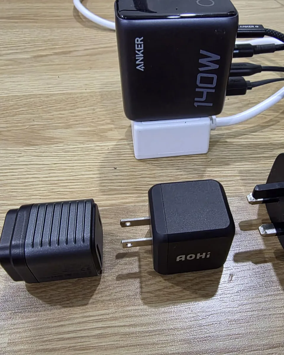 A customer photo of the Supertiny lined up with other chargers.